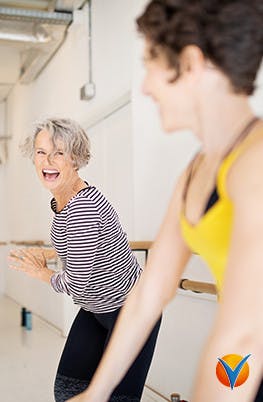Two women enjoying an exercise class free from joint pain