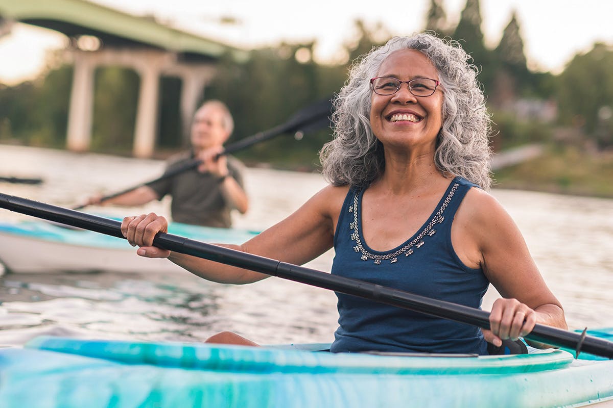 Woman smiling in a kayak