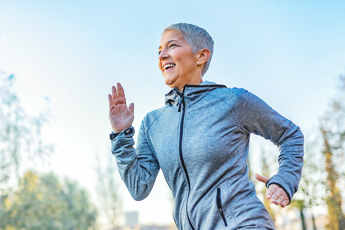 Woman running happily