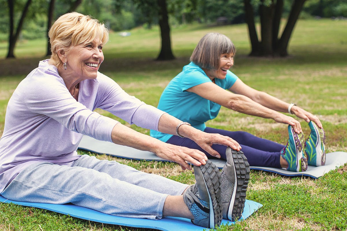 Man and woman doing yoga