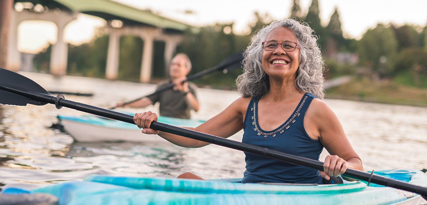 Woman smiling in a kayak