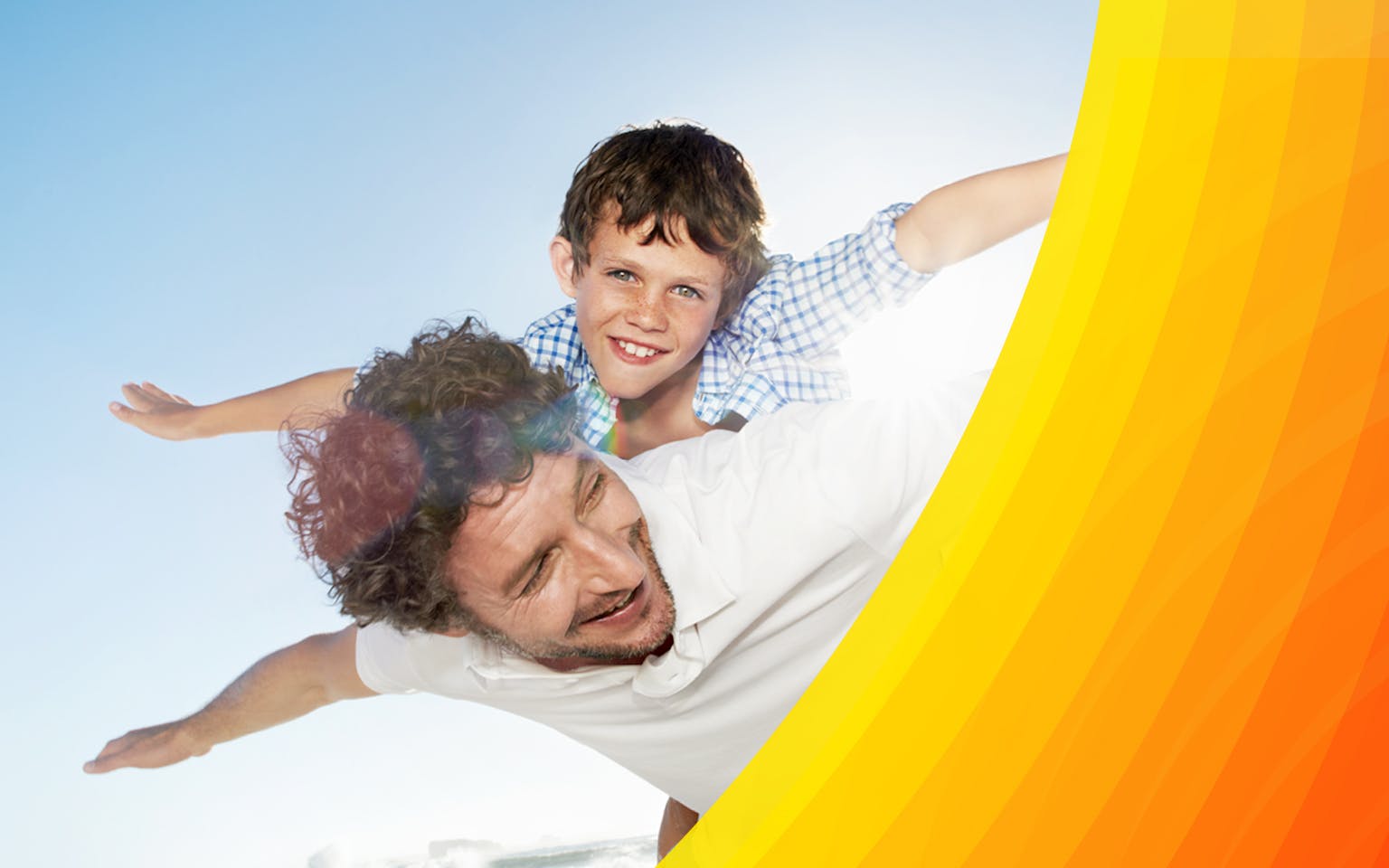 Small boy riding on father's shoulders and pretending to be a plane