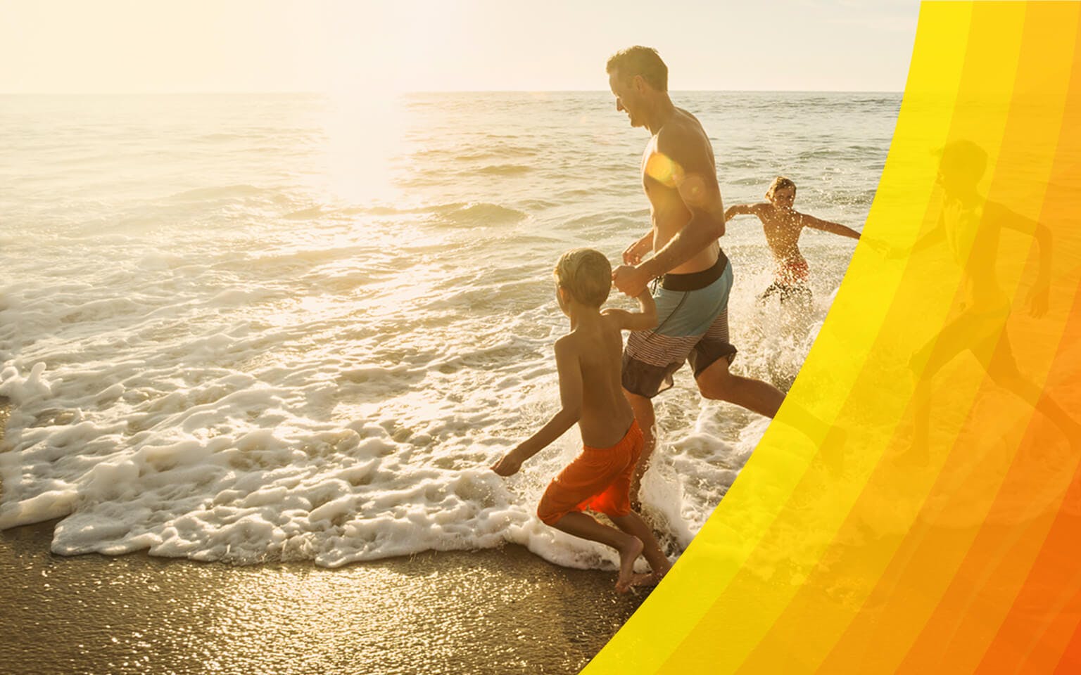 Padre e hijos en la playa
