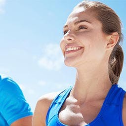 Woman smiling exercising
