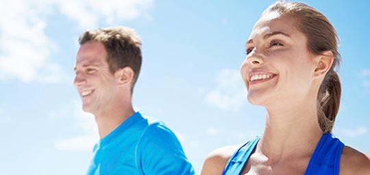 Man and woman running
