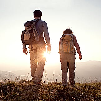 Two people hiking
