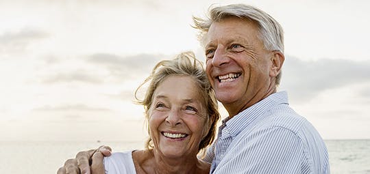 An old couple looking into the distance