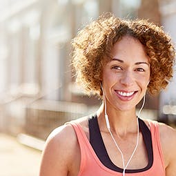 A woman smiling to the camera