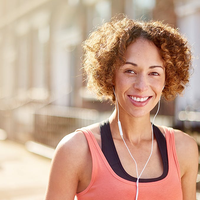 A woman smiling to the camera