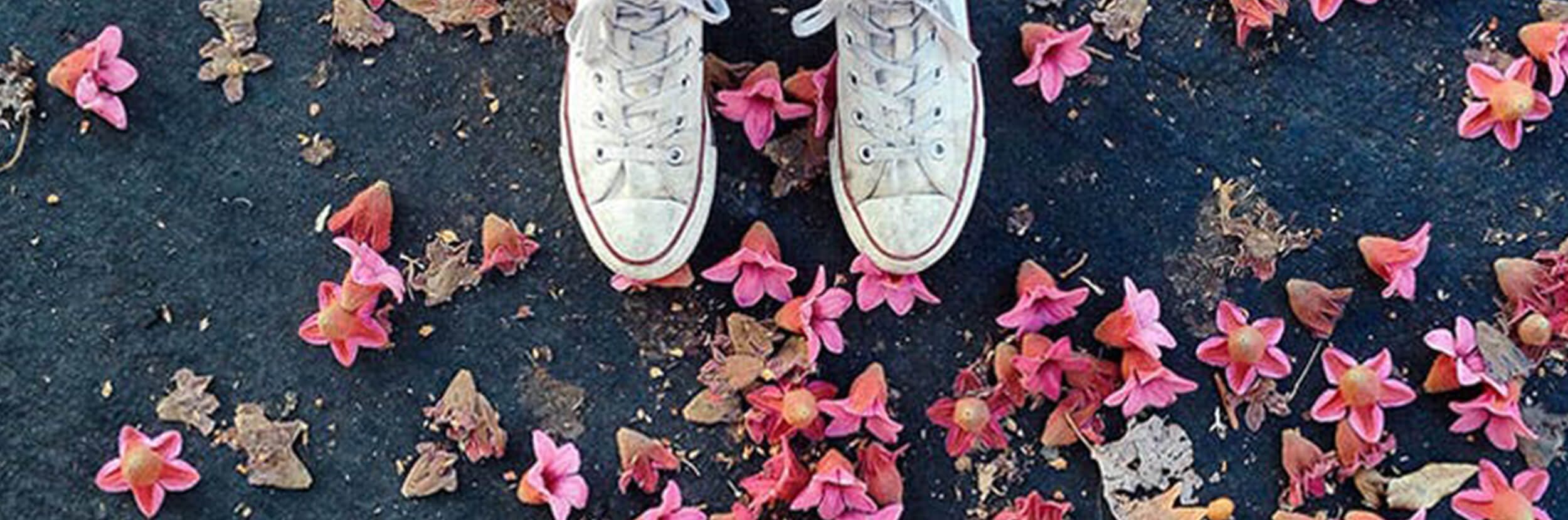 Top view from feet among flowers