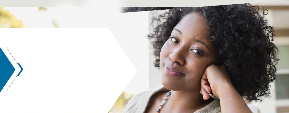 Smiling woman looking directly at camera Smiling woman looking directly at camera